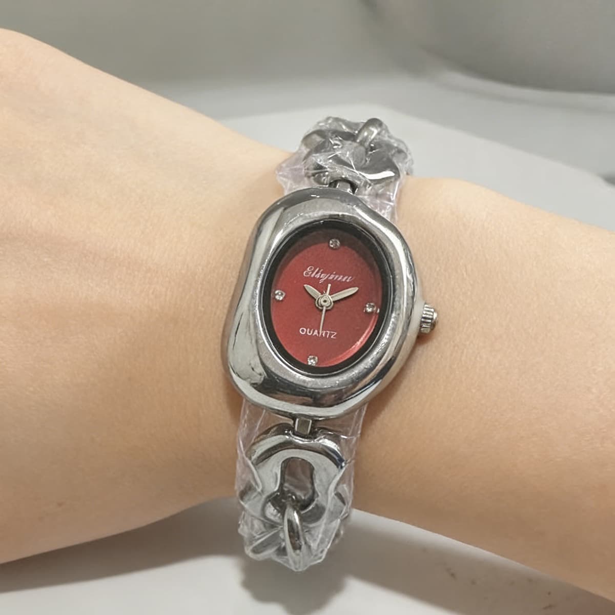 Silver shell red face