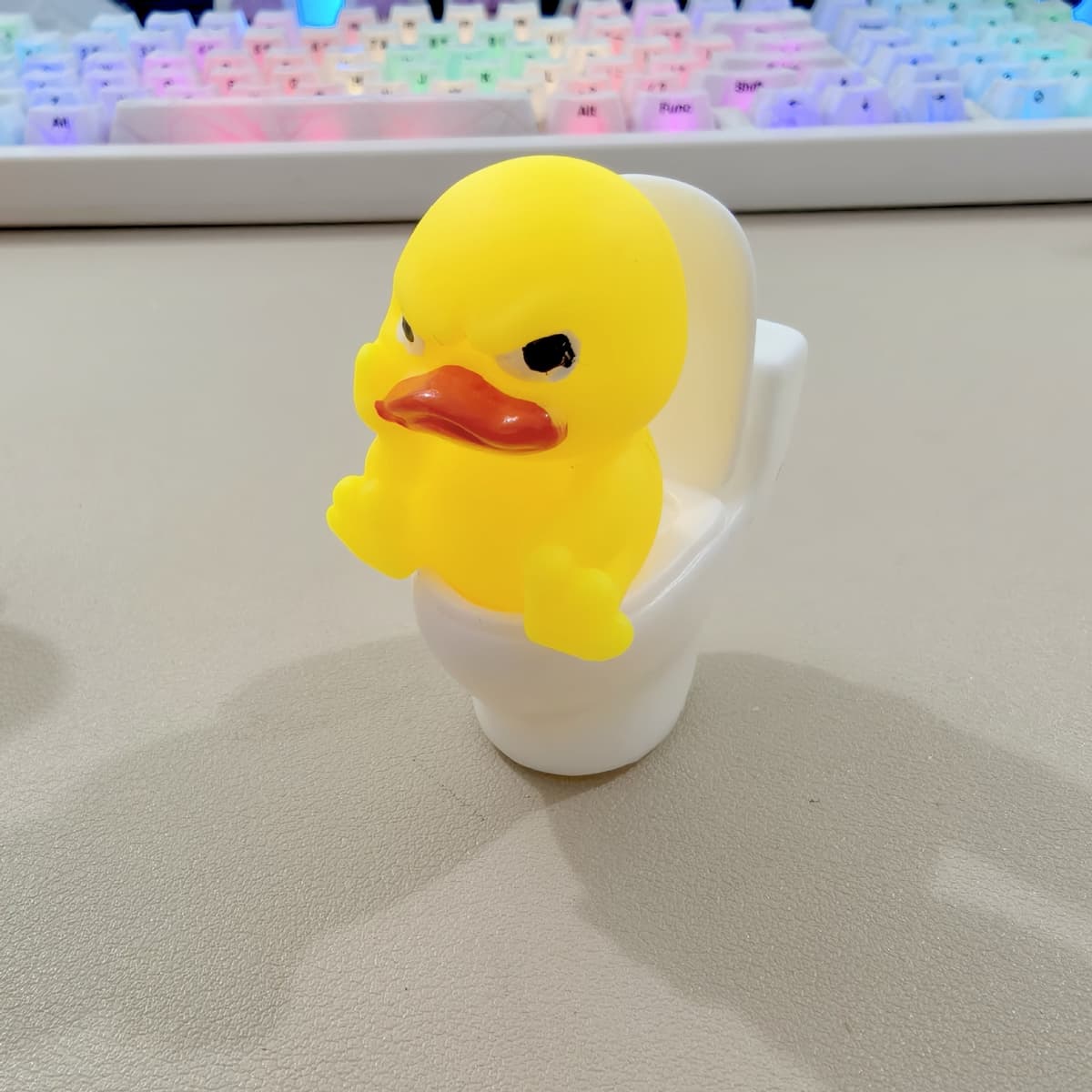 Toilet duck - adhesive backed