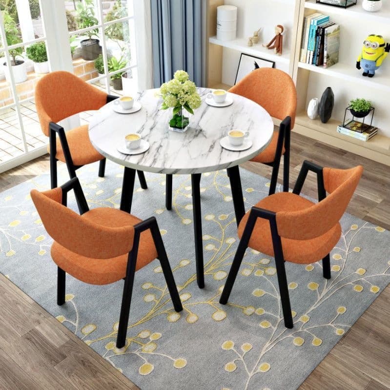 Imitation white marble table + orange cloth chair