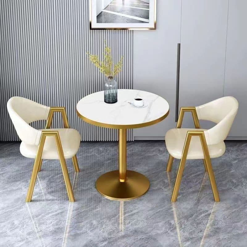 Imitation white marble table top + off-white leather chair