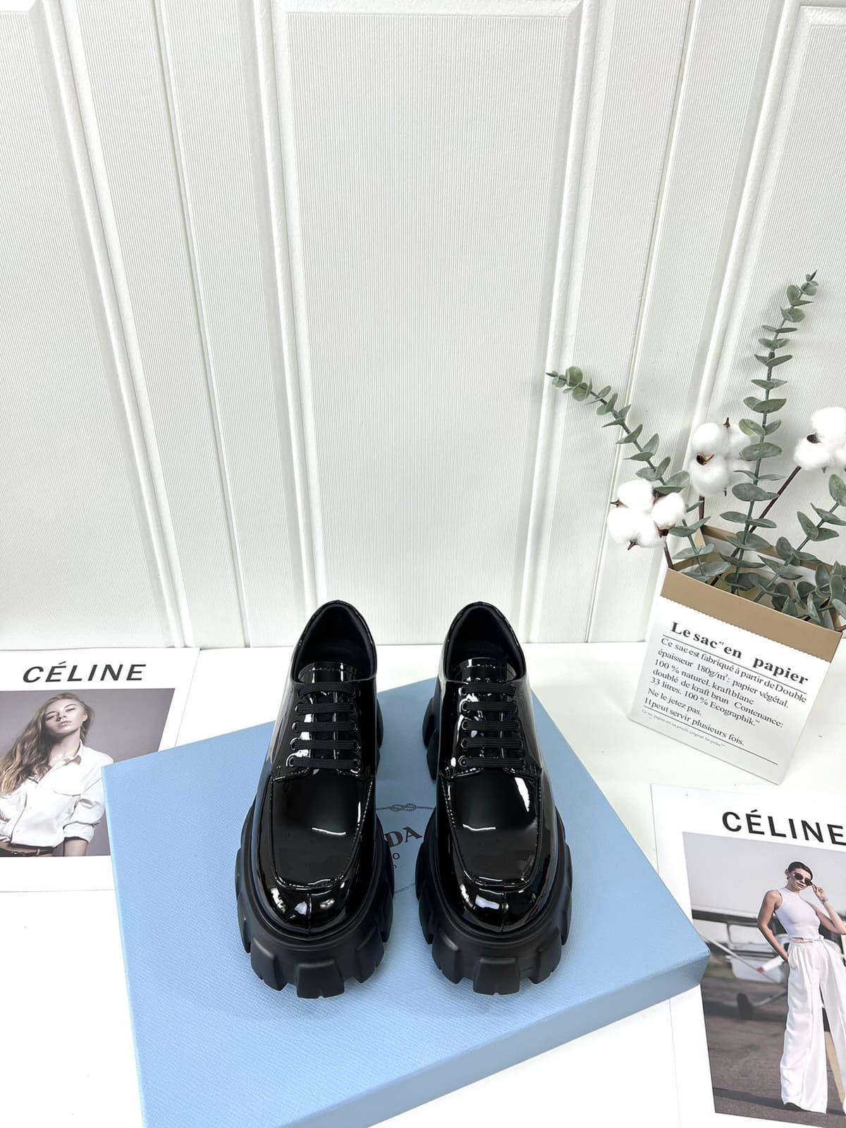 Black patent leather lace-up with stamped detailing