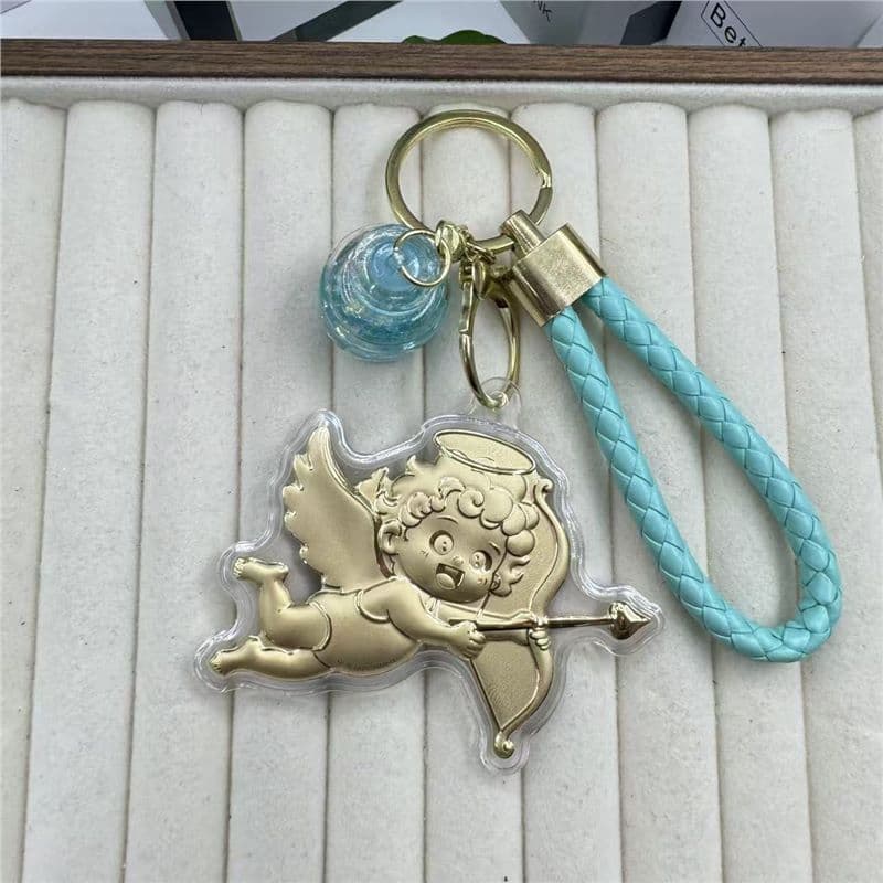 Cupid angel + blue wishing bottle