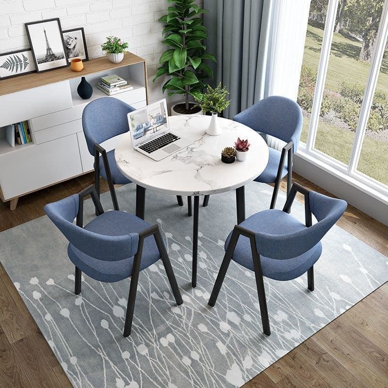 Imitation white marble table + dark blue cloth chairs