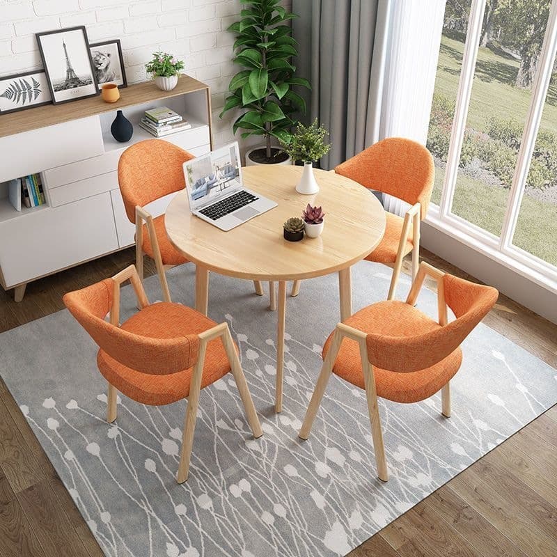 Light wood grain single table + orange cloth chair