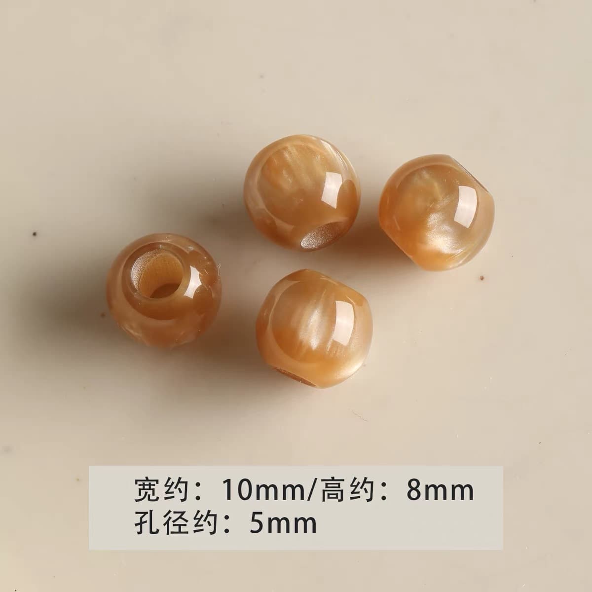 1 large hole light amber round bead