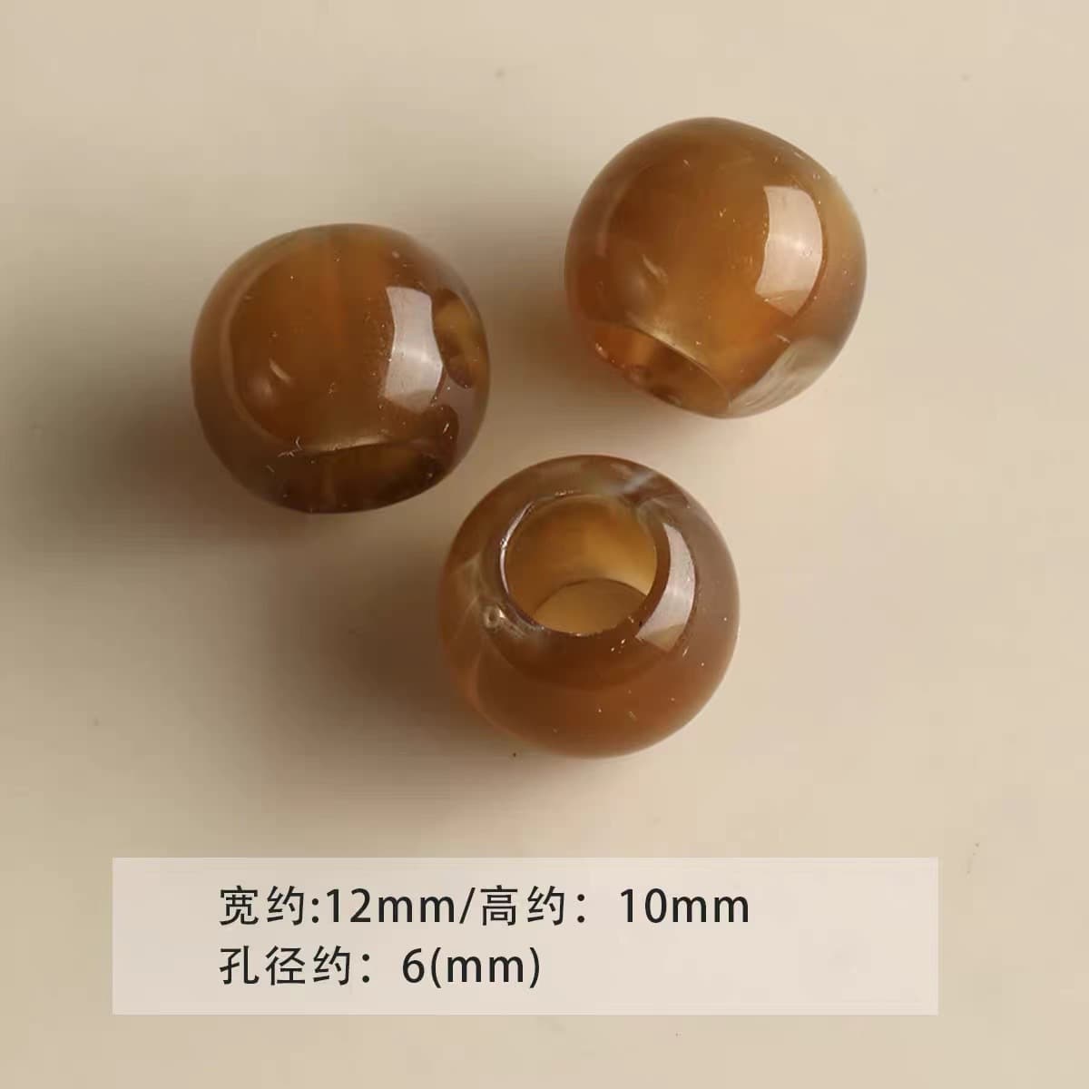 1 large hole deep amber round bead