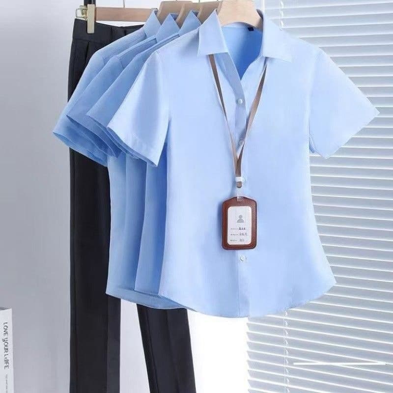 Sky blue v-neck short sleeves with exposed buttons