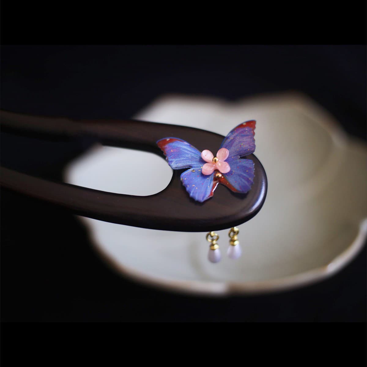 U-shaped purple butterfly [ebony]