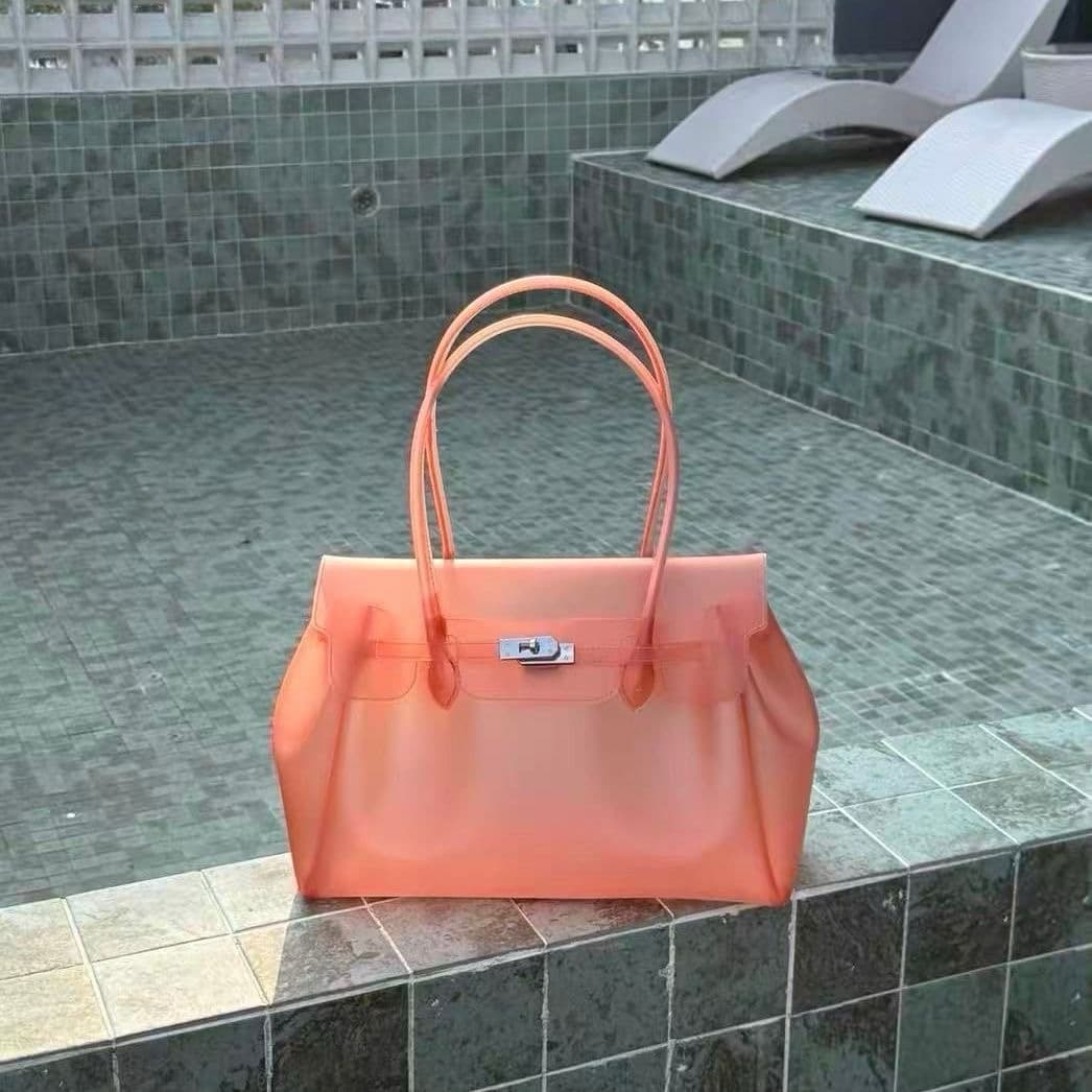 Tpu orange (with key + rivets on the bottom)