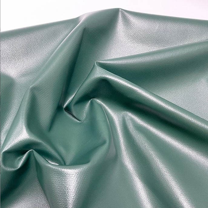 Tekstil dəri parça, 0.6mm qalınlıq, 1.6m en, tor əsaslı PVC liçi naxışlı (çanta, mebel üçün) 3