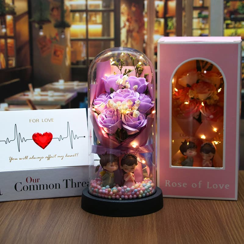 [7 light purple roses + colorful balls + couple dolls (finished product)