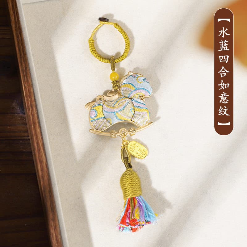 Aqua blue four-part wish pattern (keychain)