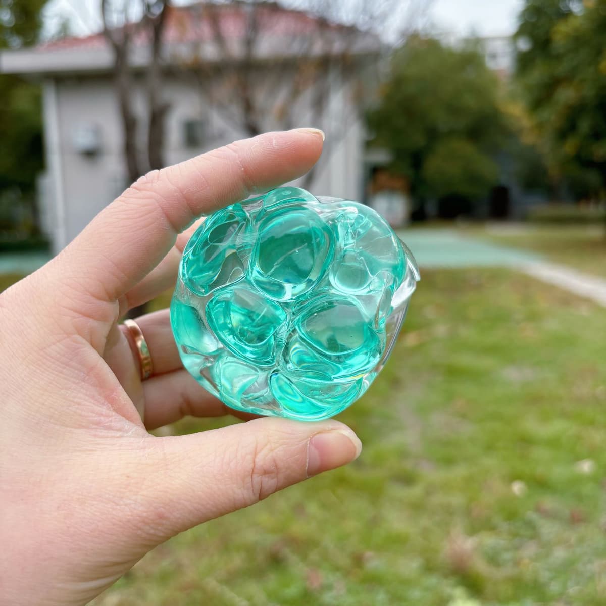 6.0 emerald green rattle ball