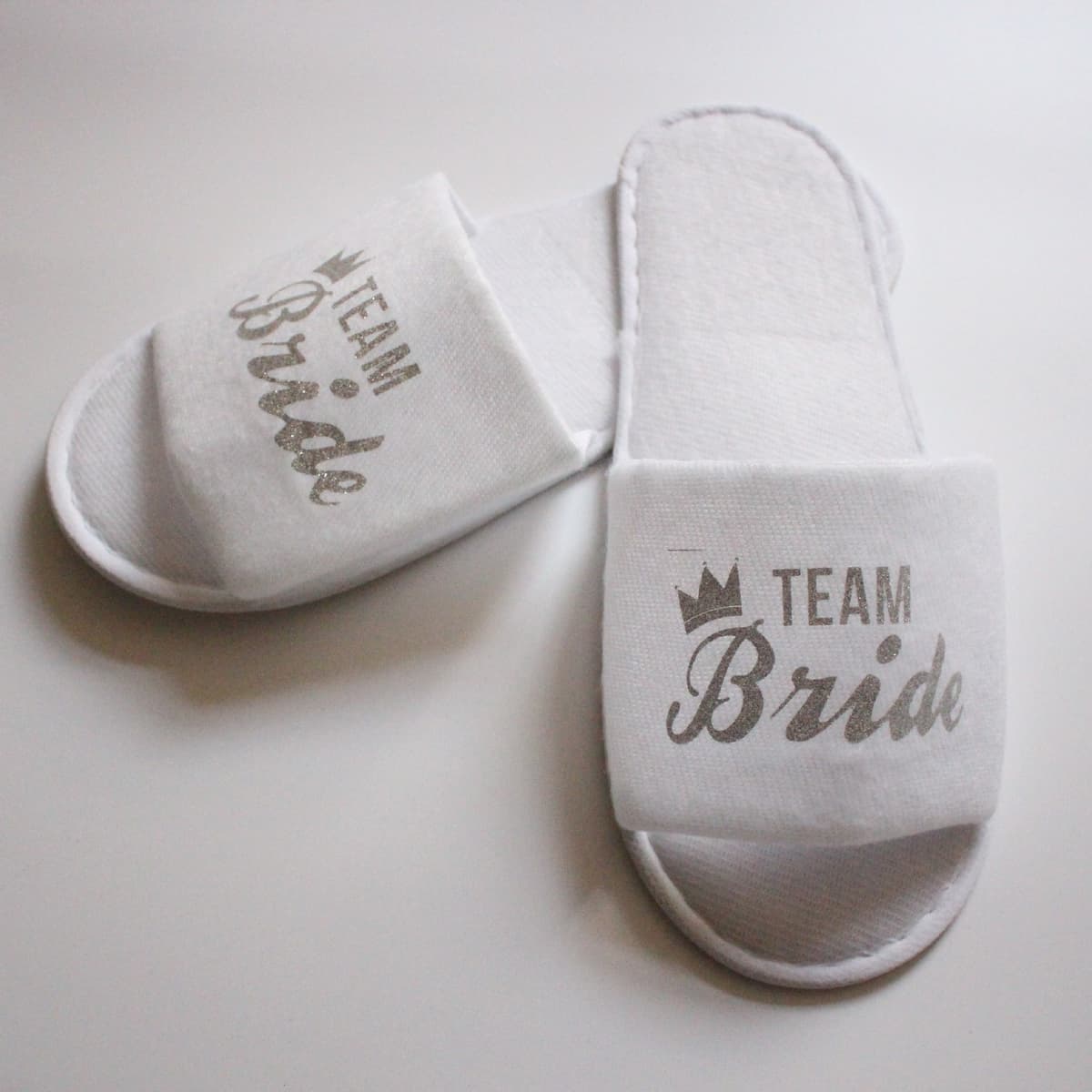 White Slippers/Silver Crown Letters team bride