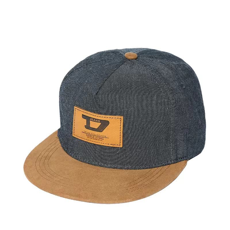 Black leather patch with "d" lettering