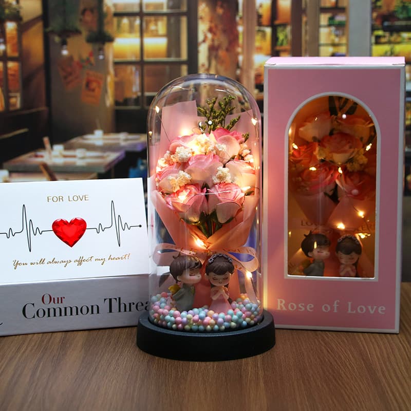 7 crushed ice pink roses + colorful balloons + couple figurines (ready-made)