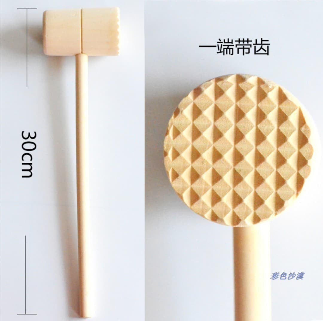 Wooden hammer with teeth