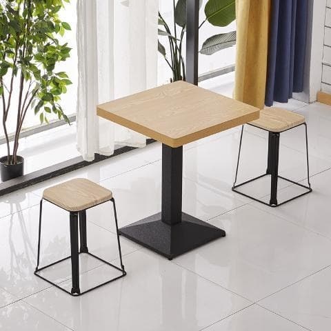 Light yellow wood color table and two stools