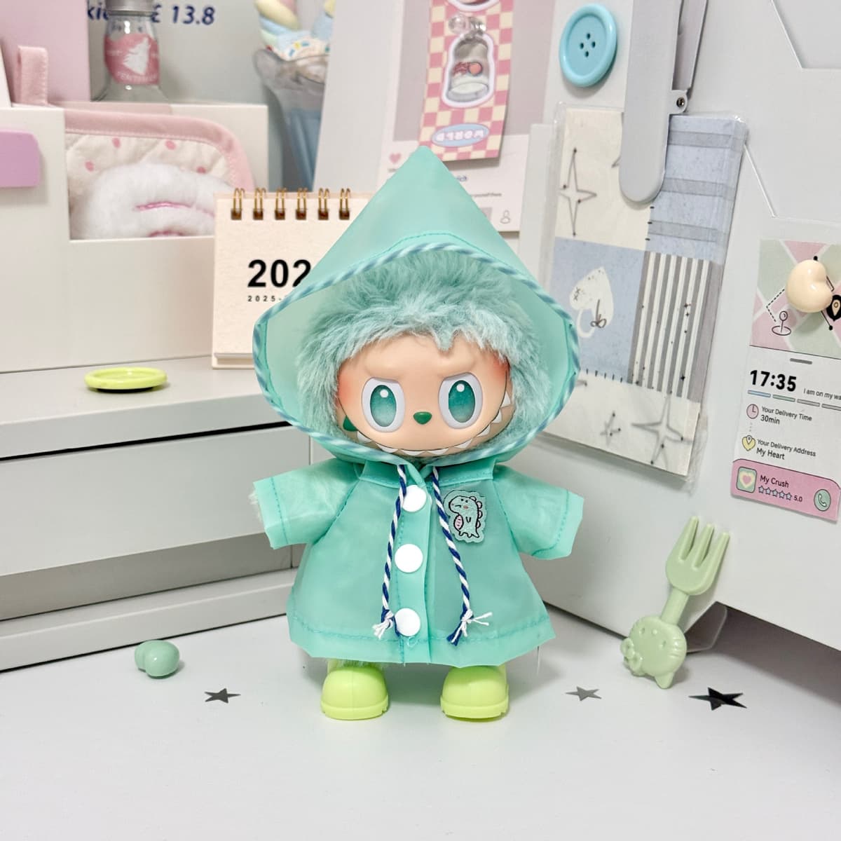 Green raincoat + matching shoes