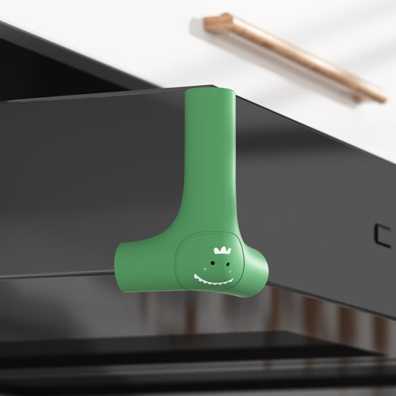 Extended dinosaur horn, green