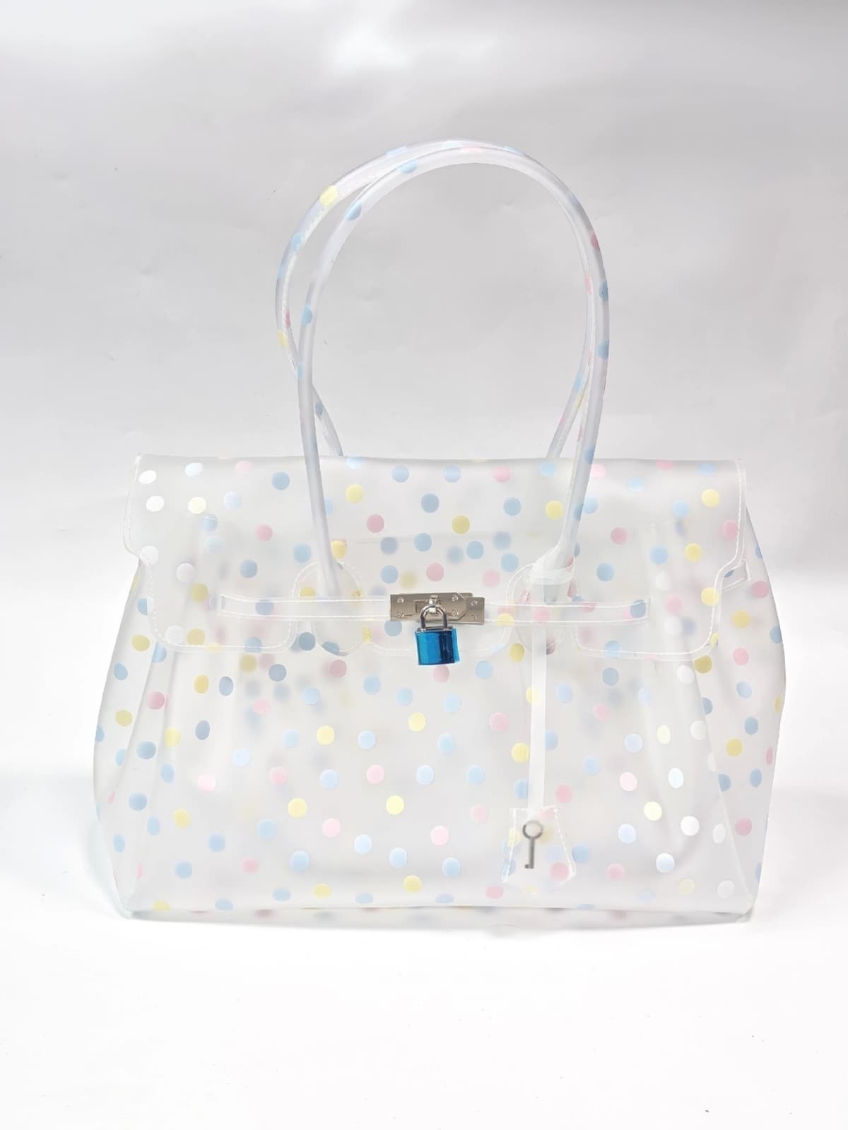 Tpu white polka dots (with key + rivets on the bottom)