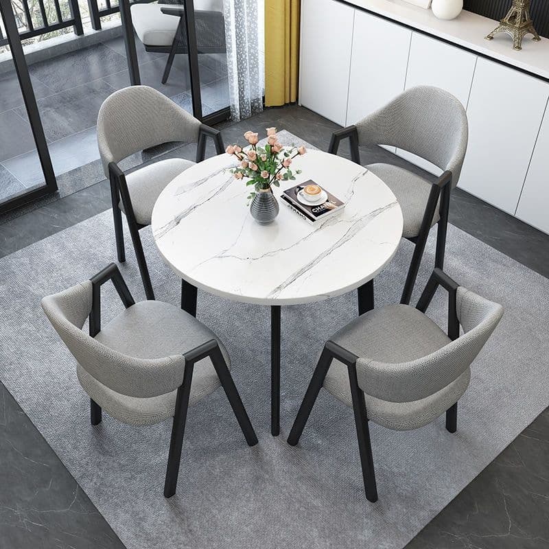 Imitation white marble table + light gray cloth chairs