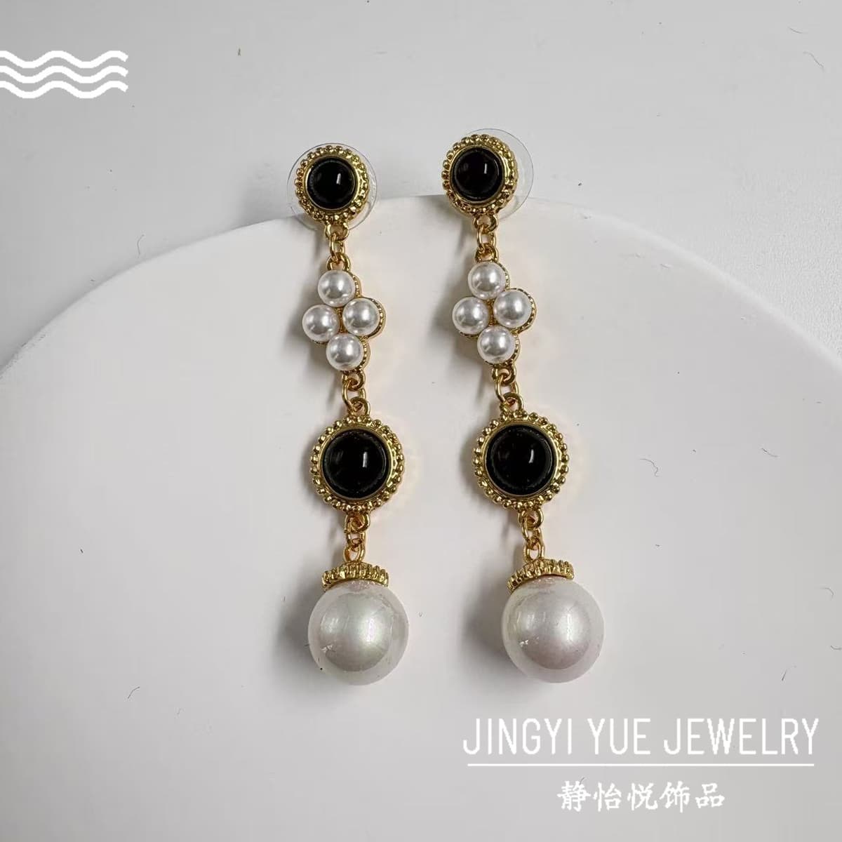 1610 black earrings