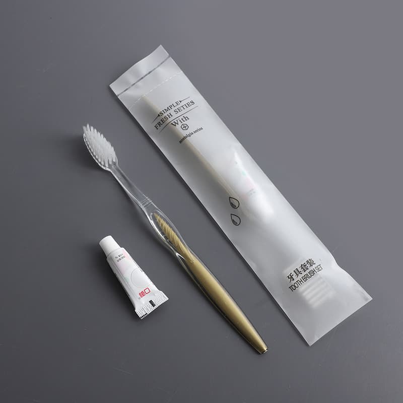 Soft film packaging + two-color leaf toothbrush + [toothpaste with lid]