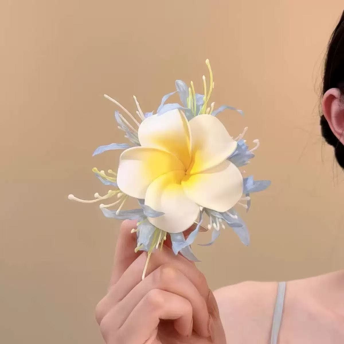 7325 "far shore" plumeria hair clip - light blue