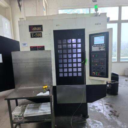 İşlənmiş Taikuun T-500 CNC qazma və yiv açma mərkəzi